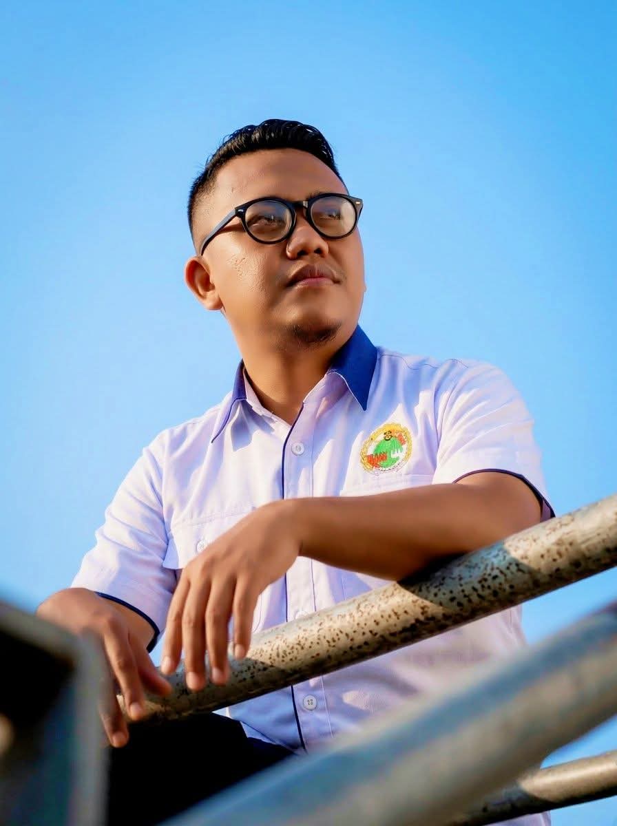 Alan Pakaya, S.I.Kom.